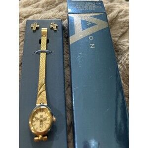 Avon Gold tone rhinestone cross watch 332J NOS